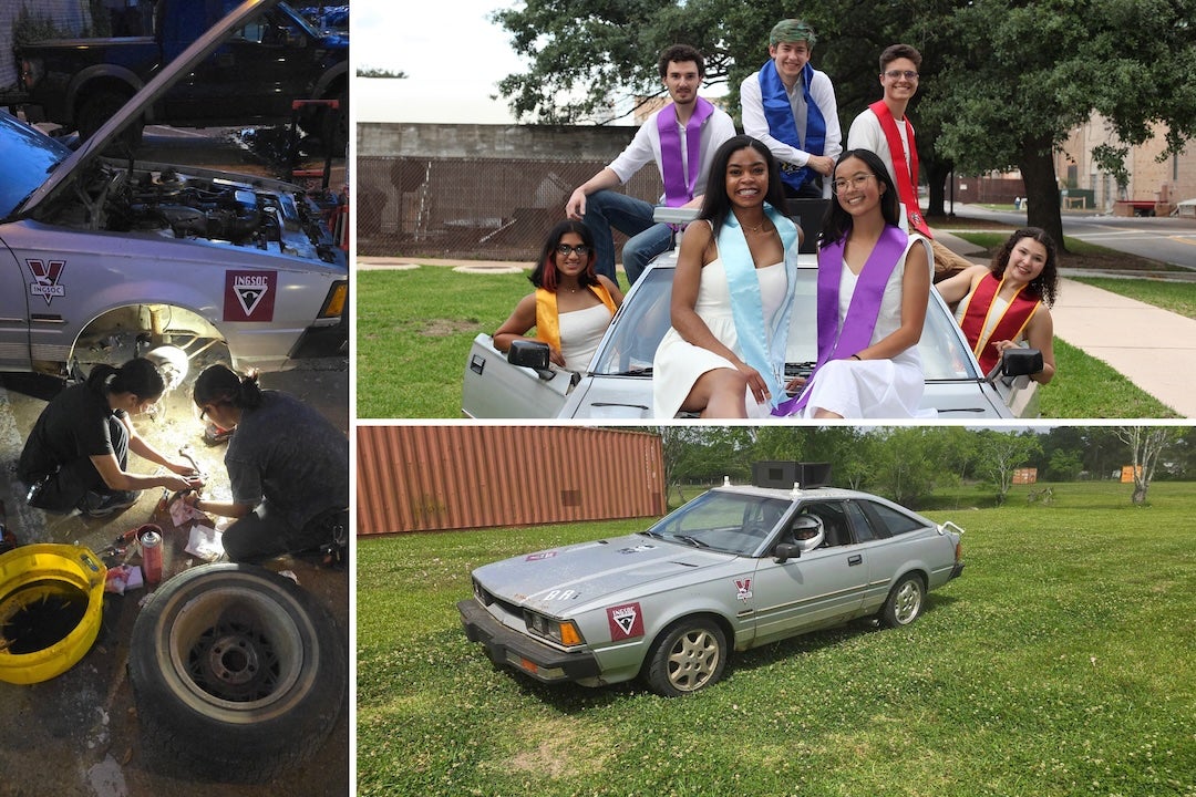 students working on and posing with a car they refurbished