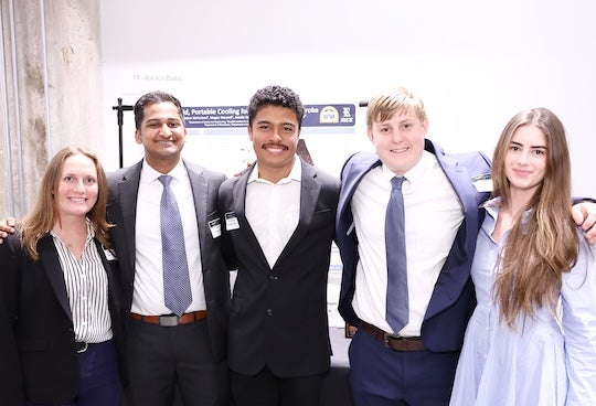 5 students posing for photo