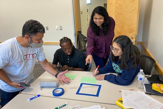 Teachers work through a lesson in the Rice University-based Applied Mathematics Program