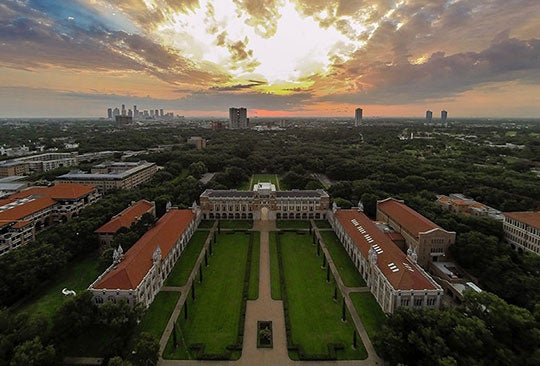 Sunrise aerial with Lovett Hall and Houston skyline