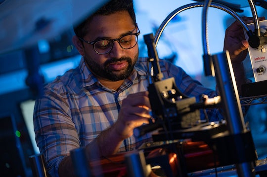 Rice University postdoctoral fellow Kedar Joshi prepares an experiment at the Biswal Lab to see how magnetic fields will affect a colloid of magnetic particles. Joshi and his mentor, chemical and biomolecular engineer Sibani Lisa Biswal, recently discovered unusual properties in magnetized colloids that adhere to Kelvin’s equation, which models thermodynamics. (Credit: Jeff Fitlow/Rice University)