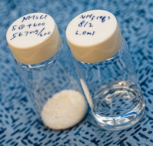 Ammonium chloride, at left, and liquid ammonia are the products of a catalyst developed by engineers at Rice University to convert wastewater into useful chemicals. (Credit: Jeff Fitlow/Rice University)