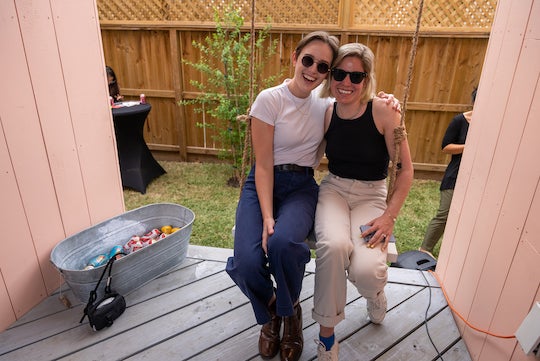 Rice University alumni and Auxiliary ADU designers Madeleine Pelzel, left, and Kati Gullick in the finished structure’s dogtrot at the April 26 open house. (Credit: Brandon Martin/Rice University)