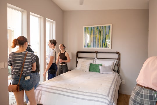 The bedroom at Rice Architecture Construct's Auxiliary ADU is separated from the main living space by a traditional dogtrot, a breezeway through the center of the house that helps keep it cool in the summer. (Credit: Brandon Martin/Rice University)