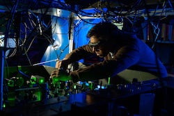 Rice University physicist Ruwan Senaratne and colleagues used laser cooling to build a quantum simulator where they could repeatedly view and photograph a quantum effect called spin-charge separation. (Photo by Jeff Fitlow/Rice University)