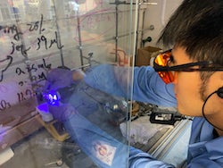 Rice University graduate student Kang-Jie (Harry) Bian sets up light-sensitive molecules for an experiment in the lab of chemist Julian West. Bian is lead author of a study inspired by natural processes to enable the modular difunctionalization of alkene molecules for drug and materials design. (Credit: Rice University)