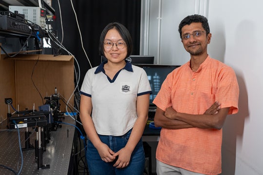 Haiyun Guo and Ashok Veeraraghavan in the lab