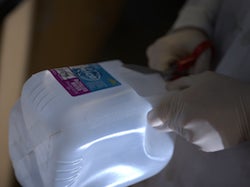A plastic jug is fodder for a material developed at Rice University that turns waste plastic into a material that absorbs carbon dioxide. 