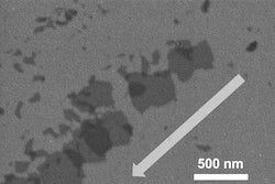 Particles of mechanically sheared flash boron nitride, as seen through a scanning electron microscope. The arrow shows the direction of shear force applied to the material. The flash Joule heating process developed at Rice University creates turbostratic materials with weak interactions between layers, making them easier to separate. (Credit: Tour Group/Rice University) 