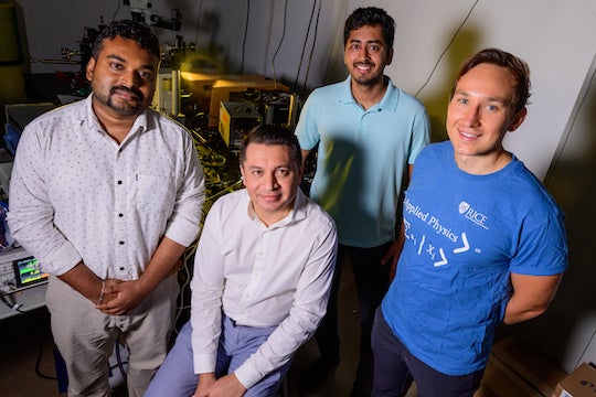 Rice University researchers led a team that developed a method to make multilayer perovskite solar cells that match the efficiency of current commercial cells. From left: Siraj Sidhik, Aditya Mohite, Ayush Agrawal and Andrew Torma. Photo by Jeff Fitlow