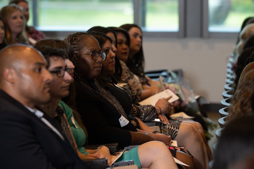 Attendees listen during Glasscock's annual end-of-year celebration for School Literacy and Culture May 15, 2024.