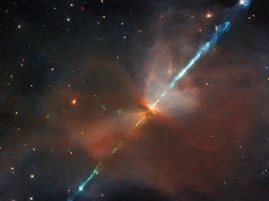 An image captured by the Hubble Space Telescope of HH111