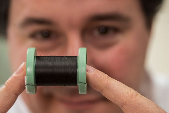 Matteo Pasquali with a spool of fiber made of pure carbon nanotubes