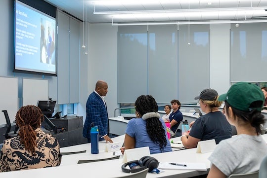 Doerr Institute Director Bernie Banks speaks to students at a catalyst workshop.