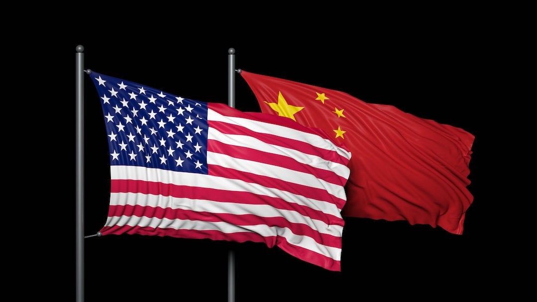 Photo of US and Chinese flags.