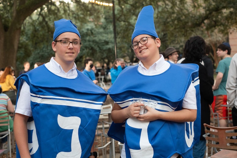 Boys in dreidel costumes