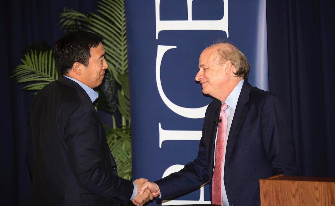 Andrew Yang shakes hands with Rice President David Leebron. Photo by Tommy LaVergne.