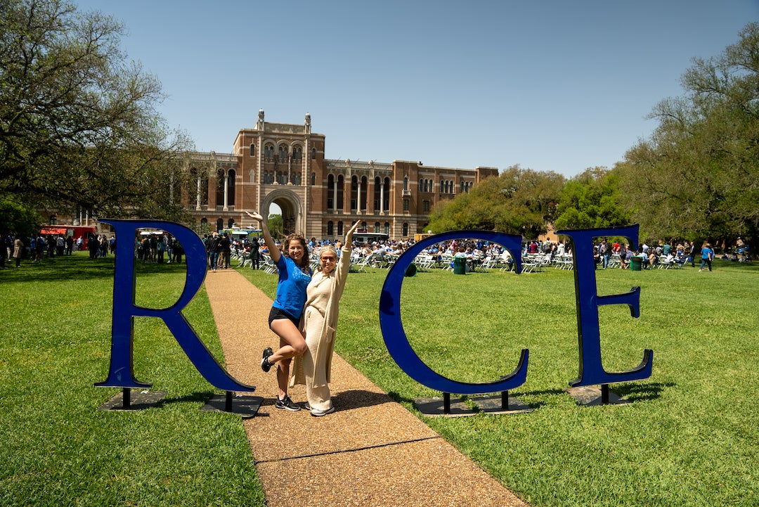 Admitted students and parents posing for photos at Rice