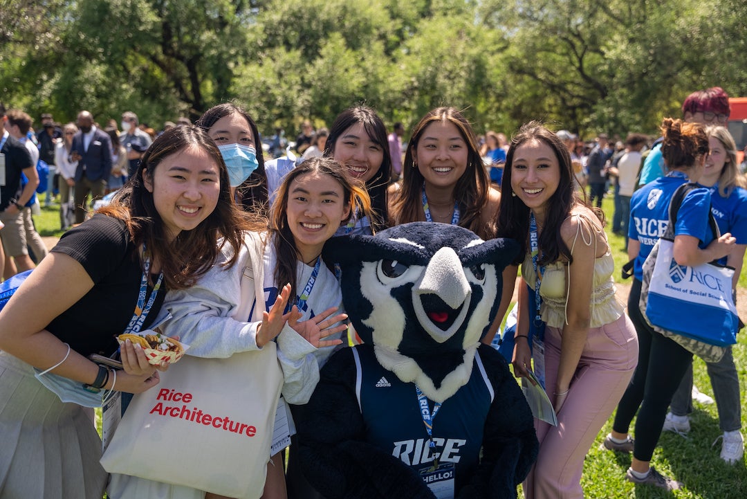 Admitted student pose with Rice mascot Sammy the Owl