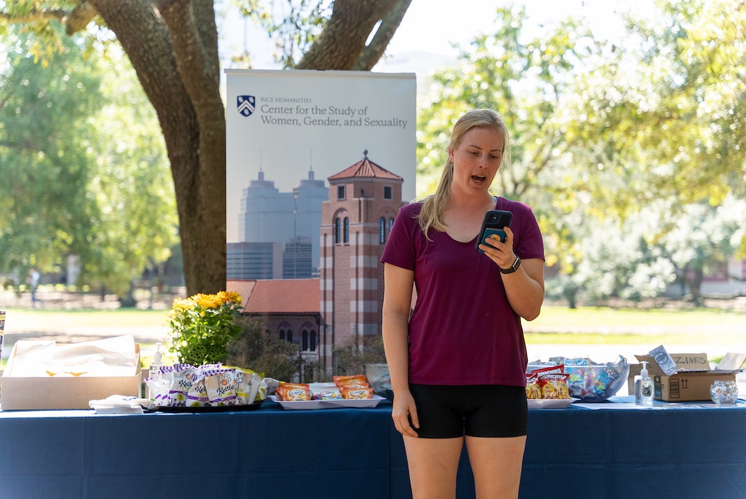 Rice student reads book excerpt from phone at banned books read out event