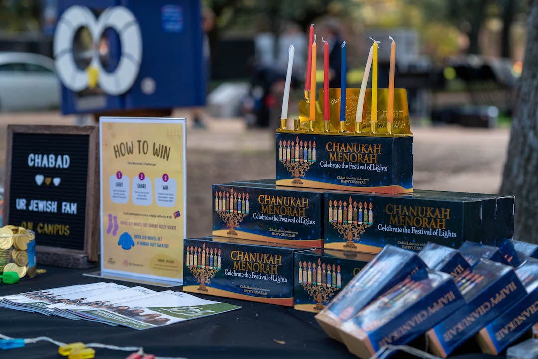 Giveaway gifts at pre-Hannukah bash, including free menorahs