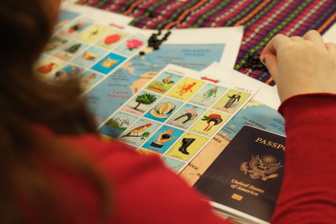 Loteria cards and passport from educational games at event