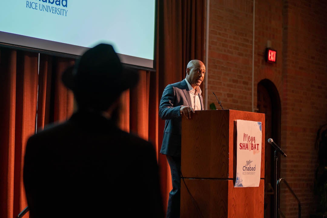 Rice President Reginald DesRoches speaking at Mega Shabbat 2023