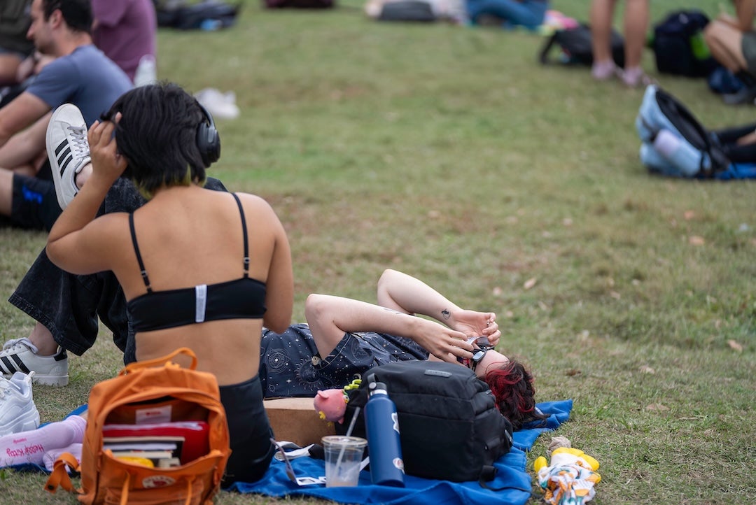 A student views the eclipse on April 8, 2024 at the central quad.