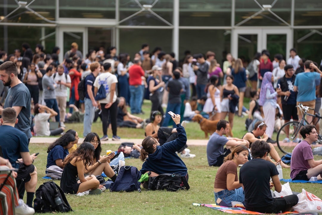 Students view the eclipse on April 8, 2024 at the central quad.