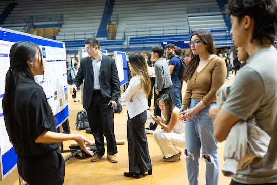 The event hosted at Tudor Fieldhouse provided a platform for undergraduate students in natural sciences to showcase their research endeavors to an audience of peers, faculty members and graduate students.  The roster of attendees included Thomas Killian, dean of the Wiess School of Natural Sciences, and Rice alumnus and Nobel Prize laureate Robert Woodrow Wilson ’57. Photos courtesy Jeff Fitlow/Rice University.