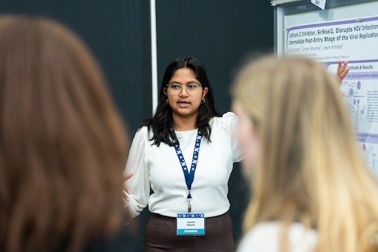 Ankita Rajesh, a sophomore majoring in biosciences, presents her research during the Natural Sciences Undergraduate Research Symposium at Rice University.