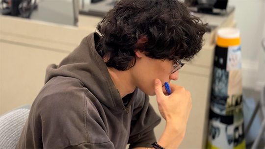 Senior AJ Shin in class