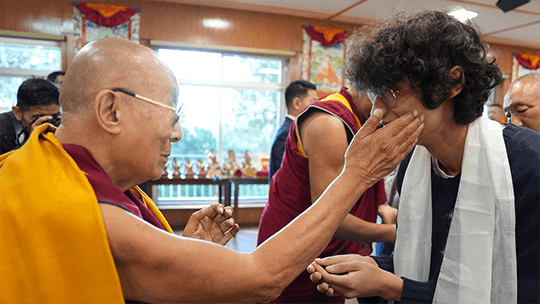 AJ Shin with monk during studies in Nepal
