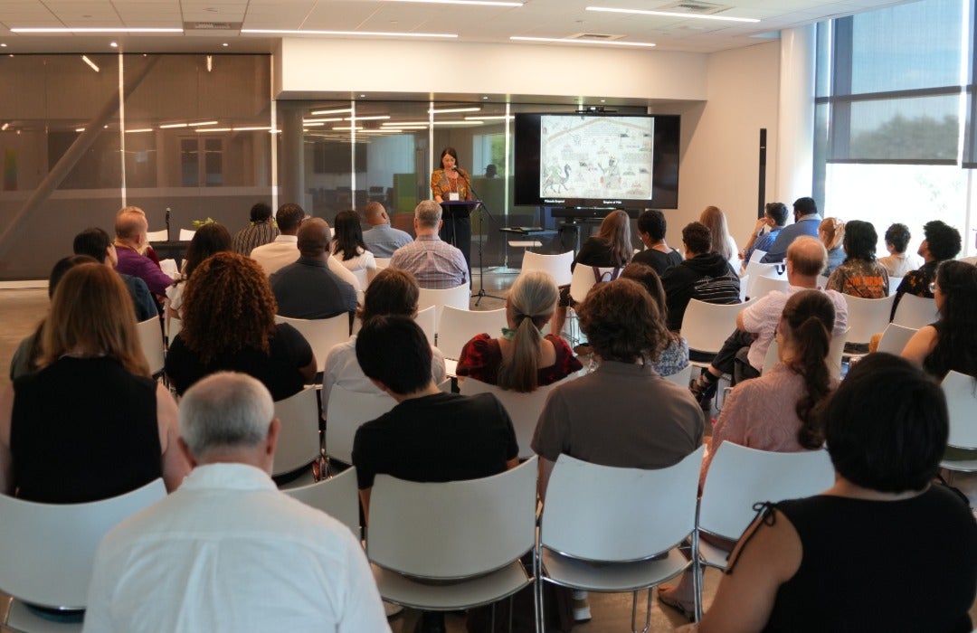 Wide shot of the audience at the Across Two Seas symposium