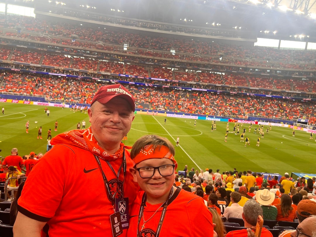 Mauricio Benitez with his grandson Hiram Duran-Benitez at the Netherlands vs. Sweden match.