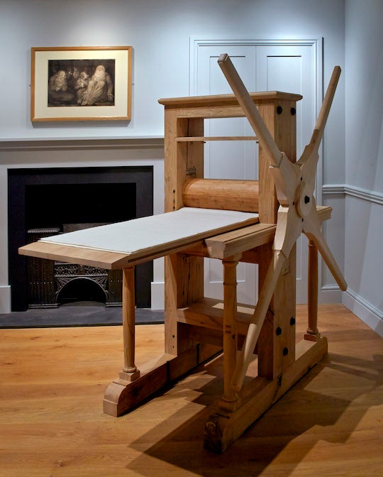 The star-wheel copper-plate rolling press that famous Romantic poet and artist William Blake used to produce his masterworks is pictured. 