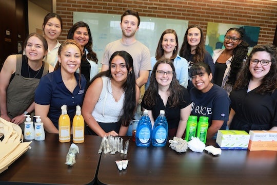 Rice University students and staff came together to pack care packages for refugees in Houston, offering essential supplies and a message of welcome and support.