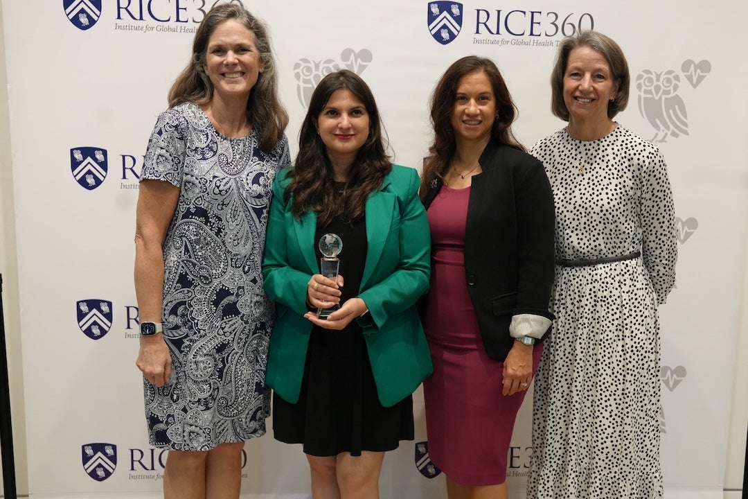 Alum Dr. Roxanna Daneshjou ’09 (second from left) after receiving the Rice360 Alumni Leadership Award with Rice360 co-directors Maria Oden (left) and Rebecca Richards-Kortum (far right) and executive director Yvette Mirabal (second from right). (Photo by Ebony Thornton)