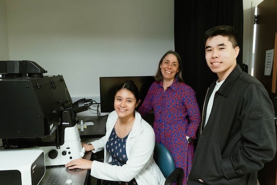 Ajo-Franklin and team at microscope
