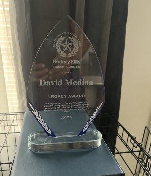 David Medina accepts one of his awards.