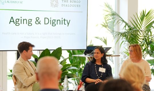 Amy Dittmar seated for a panel discussion at the Borgo Dialogues