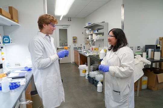 Simon King and Sohini Bhattacharyya, a research scientist in Ajayan’s lab.
