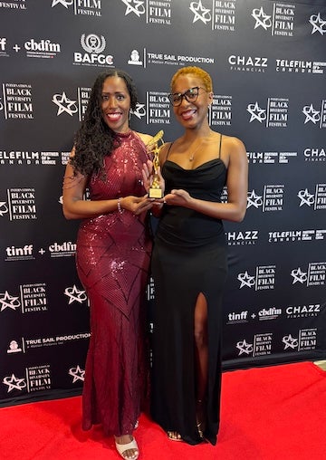 Elizabeth Hordge-Freeman (left) and Tabria Snowden (right), co-directors of Journey Towards Justice at the International Black & Diversity Film Festival in Ontario, Canada.