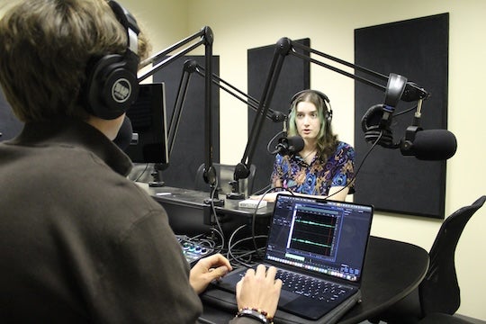 Mateo DeVries and Paola Hoffman in the Houston Newsroom podcast studio.