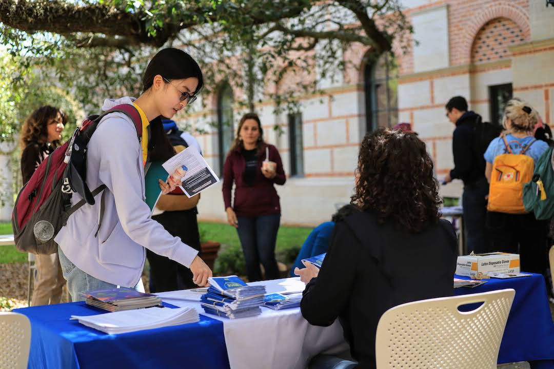 Students learning about fall 2022 courses