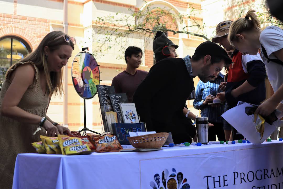 Humanities staff prep snacks and games for students