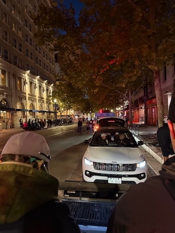 A view from the pace vehicle as volunteers prepare ahead of the women’s half marathon at the Chevron Houston Marathon, where Rice students support elite races behind the scenes. Photo courtesy of Benjamin Tijerina.