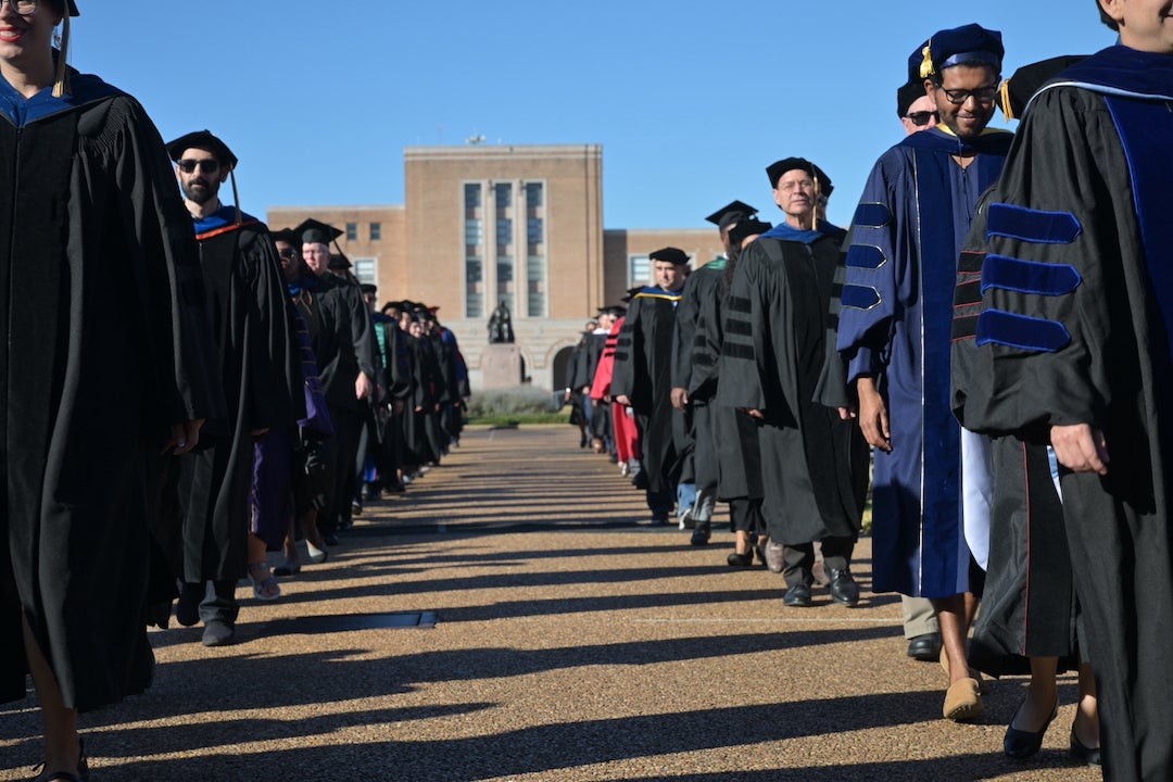 Rice faculty process into investiture ceremony