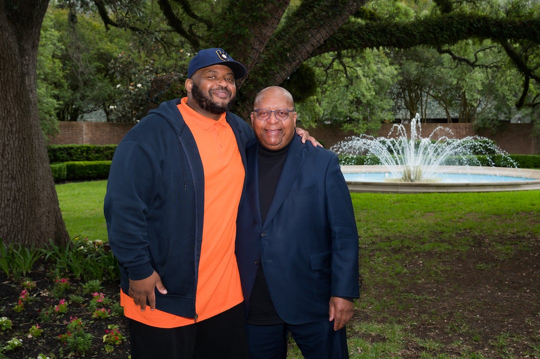 Kiese Laymon and his father at reception in Laymon's honor