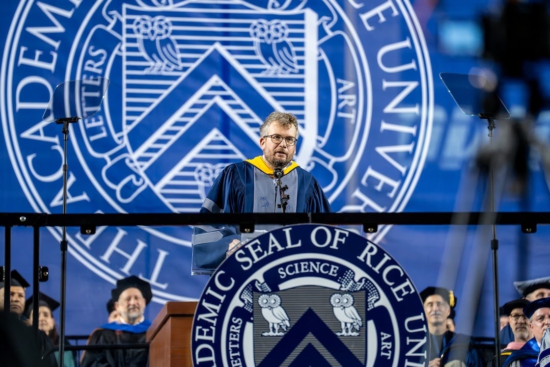 John Green at the podium at Rice Stadium